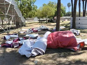 Tarps donated by Interestelar spread out on the festival site